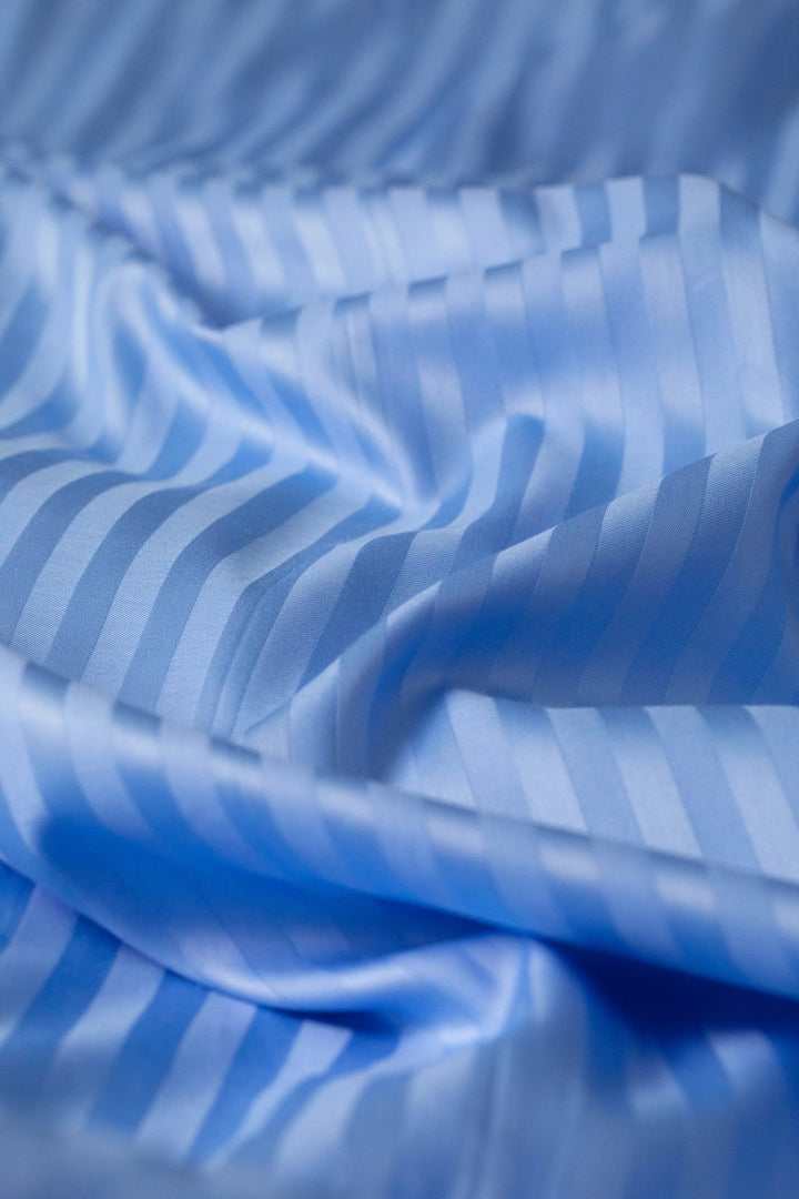 Постіль “Сапфірове Небо” у спальні  виглядає як у готелі преміум-класу.