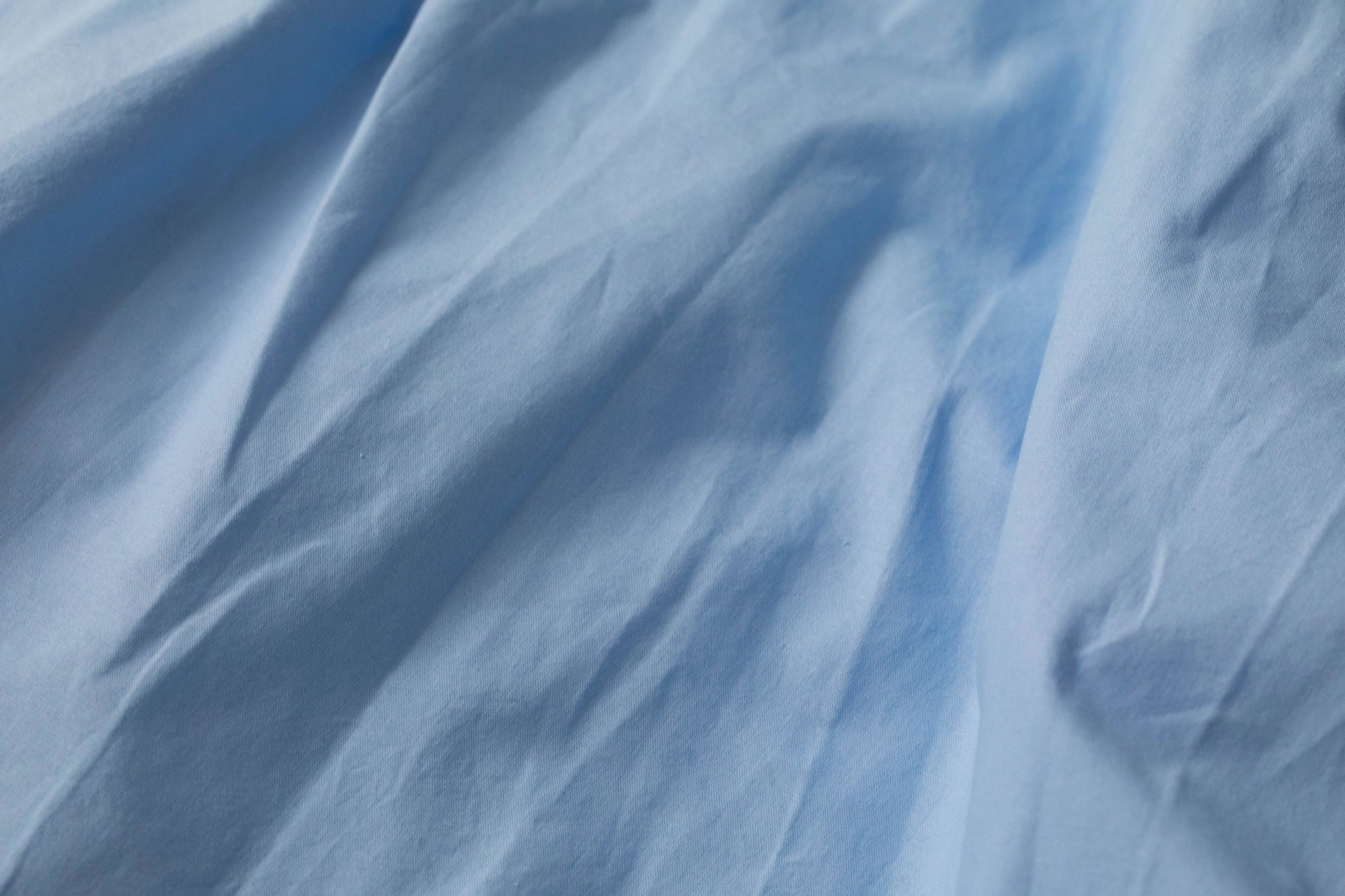 Крупний план текстилю Supreme Rest кольору Небесної Блакиті. Акцент на чистій текстурі та високій якості матеріалу.